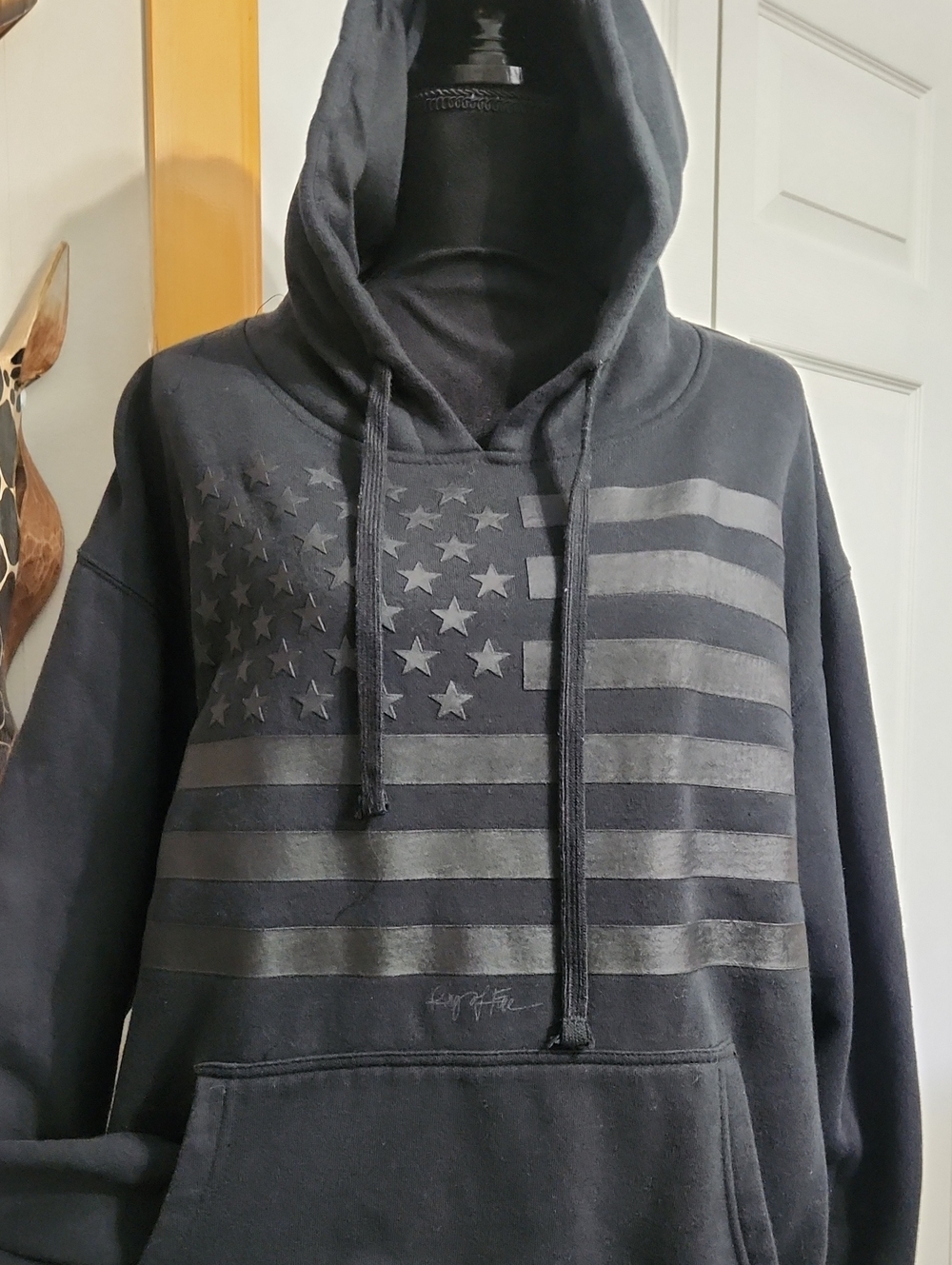 Women's Black Hoodie with Tonal American Flag Graphic